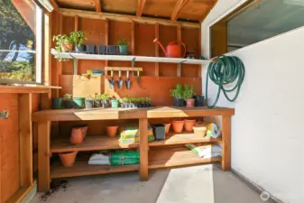 Garden shed on back side of garage - virtually staged photo.