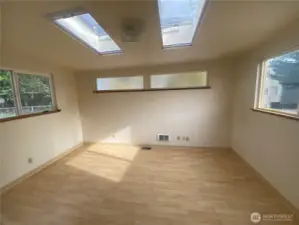 Bonus room off the kitchen with skylights.