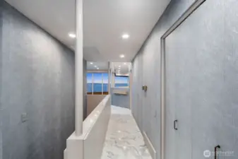 Entrance way with bathroom on the right and bedroom on the left