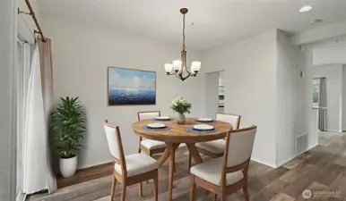 Large dinning room large enough for vanity, table and 8 chairs