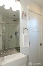 BATHROOM ALSO HAS AN IN-UNIT WASHER AND DRYER BEHIND THE CLOSED DOOR!