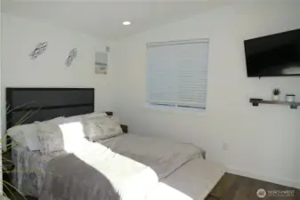 THE THIRD LEVEL BOASTS ANOTHER FULL SIZE BEDROOM WITH TELEVISION!