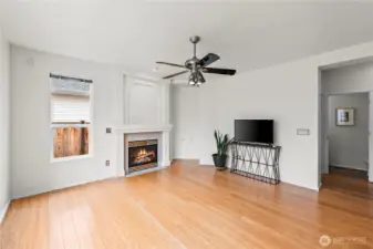 Versatile Design. This spacious living zone provides ample room for your media center and favorite decor. The neutral wall tones and abundant natural light make it easy to customize the space to fit your lifestyle, from a home theater to a peaceful reading nook.