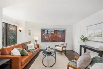 The inviting family room just off the kitchen creates a seamless gathering space perfect for everyday living and entertaining.