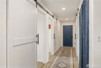 Hallway with linen closet at the end.
