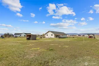Back of home, almost horse ready!  Fencing has been started.