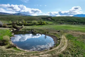 Pond setting of South side of Upper Beaver Creek Road 20 of 60 Acres.