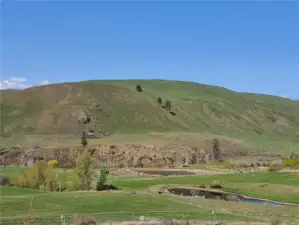 Hillside view from Ponds and Ag land on this acreage.