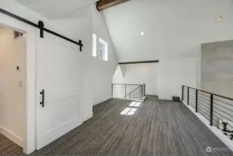 Huge 2nd floor landing can be used as flex space or home office.