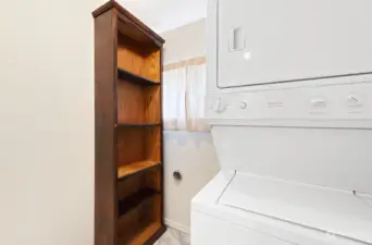 Washer and dryer stay as well as a storage cabinet.  Lots of room for more storage in the Bathroom as well!
