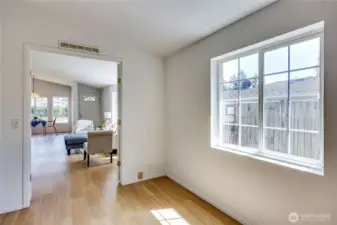 This view is from the bedroom off of the Livingroom. Easily used as an additional family room or office.