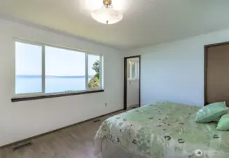 views from the primary bedroom and access to the deck