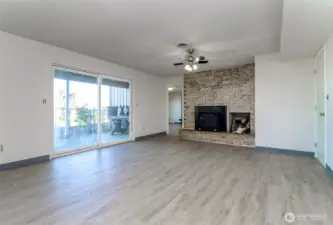Downstairs family room with access to the patio and waterfront