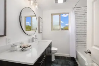 Renovated bathroom with heated tile floors