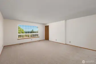 Another angle of the living room. The door in the back corner leads to the kitchen/dining area.
