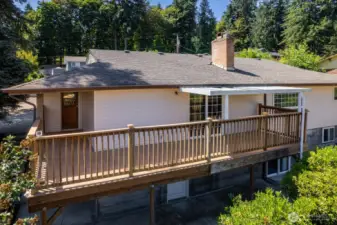 Huge deck of back of home provides wonderful territorial views, plus perfect view of the back yard