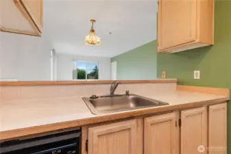Sink right next to dishwasher for easy loading!