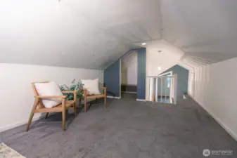 A look back toward the stairs and the walk-in closet.