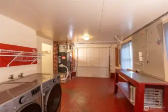 Another view of laundry/storage/garage.