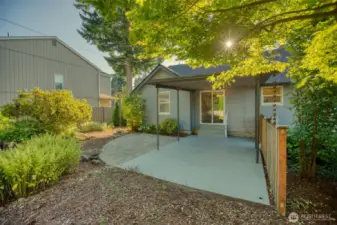 Covered back patio is adjacent to your dining room. In the past it's been used as a carport via the clear path to vehicle gate off the alley.