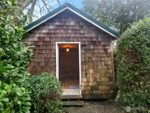 The cutest little space tucked away in the back—perfect for painting, working, or hosting extra guests!"