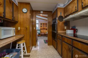 Kitchen bar area on the left looking into the living room