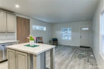 FACING FRONT ENTRANCE AND LIVING ROOM