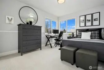 Thoughtful full-size bedroom with comfort + functionality in mind.