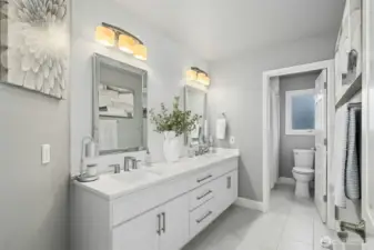 Refined, contemporary bath with a calm, nuetral palette.