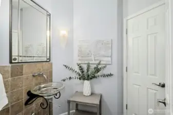 Powder on main floor with ample space for expansion.