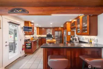 The bar is open!  Door to the left opens to the patio and BBQ area.