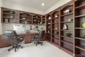 Custom cherry wood built ins with desk seating for two