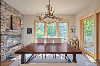 Dine with the elk horn chandelier with your gas fireplace