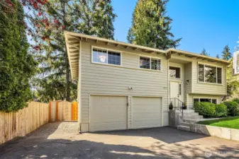HUGE 508SF garage + additional parking and a built in basketball hoop.