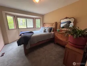 Guest Bedroom #1 has a walk-in closet and a bay window.  Plenty of room for a queen size bed.