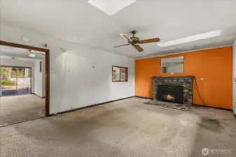 Gas powered fireplace in living room off the dining area.