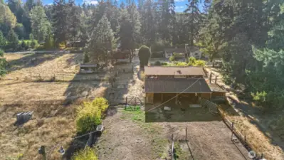 Drone view from the backside of the proeprty overlooking the barn.