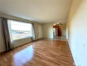 Livingroom - looking back at front door and kitchen.