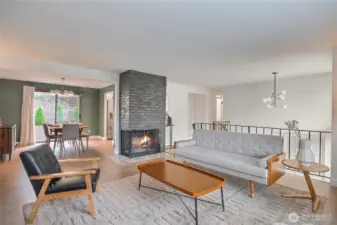 Bright open floorplan w/ brand new heat pump/AC, new hardwood flooring, stylish lighting.