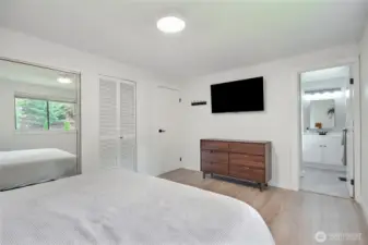 Primary bedroom with 2 closets and private bathroom.