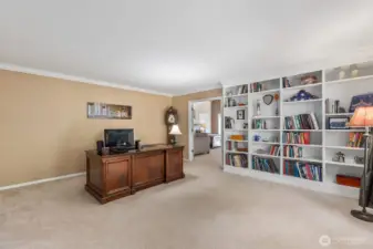 Now, this is an office!  Located between the living room and primary suite, this wing of the home is the perfect, private sanctuary needed for work from home, or just unwinding