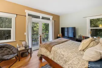 Bright and airy primary suite with plenty of natural light