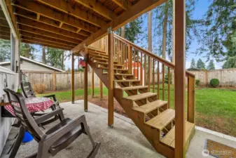 Covered patio area off lower level family room