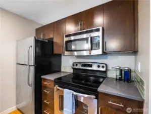 Glass tiles at the backsplash.