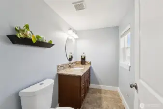 Powder room half bath on main