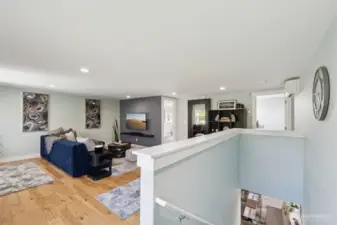 Stairs down to lower level kitchen and 2 bedrooms.