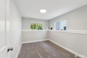 One of the two downstairs bedrooms