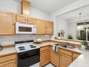 Bright open kitchen with eating space.