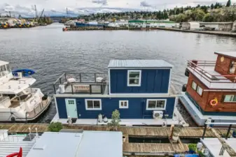Houseboat is surrounded with large picture windows and have spectacular views.