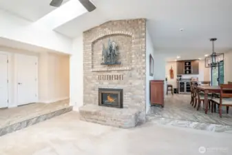 Family room and dining room steps from kitchen all with views of the lake